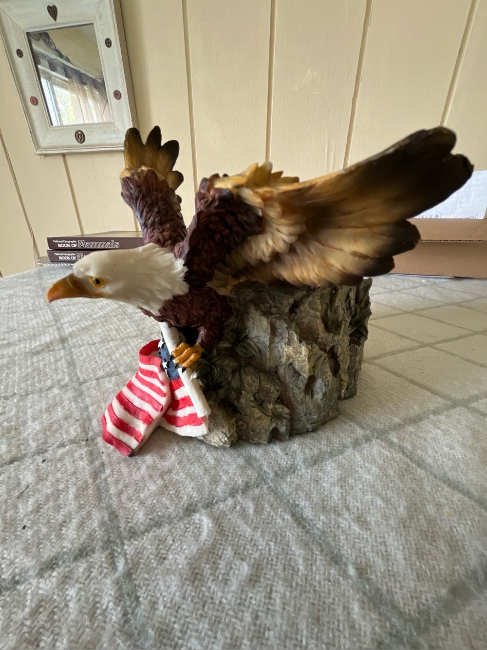 Decorative Bald Eagle Bird Candle Holder in Brown, White, and Gold holds the Fla